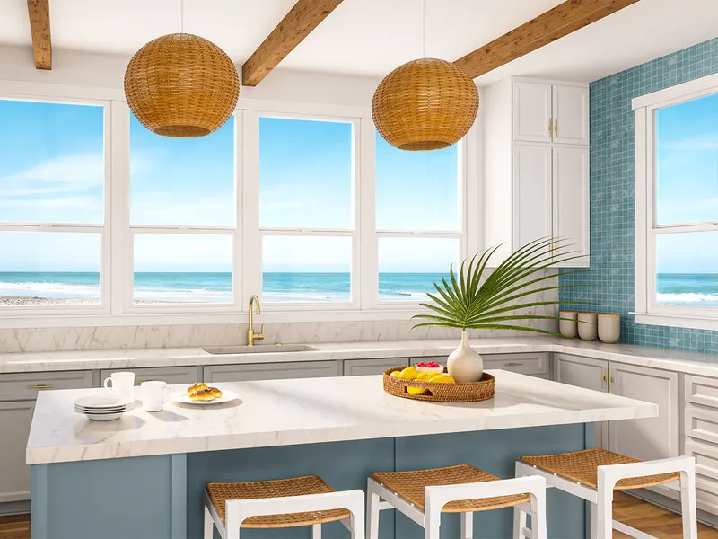 Coastal kitchen with white oriel-style single hung windows behind an island with stools
